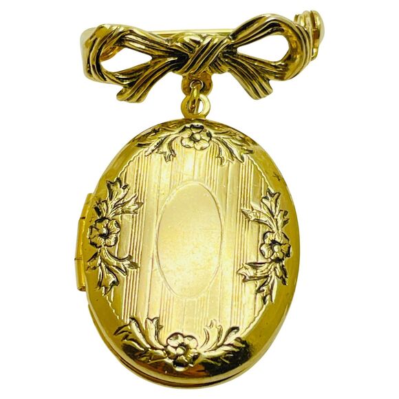 Unbranded Jewelry - Vintage gold tone bow dangle locket designer brooch